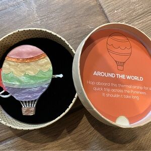 Erstwilder Around the World collectible brooch